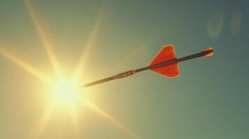 Arrow soars through a bright sky towards the sun during a clear day in a tranquil outdoor setting photo