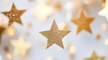 Golden stars decorate a festive background with shimmering lights creating a joyful atmosphere photo