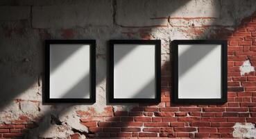 Three empty frames on a brick wall photo
