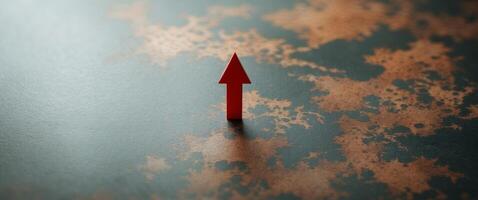 Red Arrow Symbolizing Growth and Progress on Textured Background, Pointing Upward. photo
