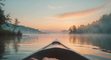 Canoeing on a Calm, Misty Lake at Sunrise, a Serene Nature Adventure, a Quiet Escape. photo