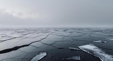 Frozen Horizon. Cracked Ice Landscape Under a Pale Sky, A Study in Texture and Tone photo