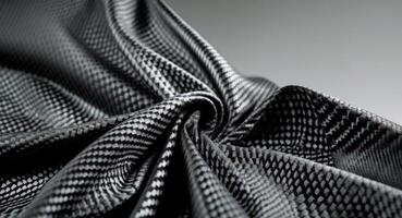 A close up of a black fabric with a pattern photo