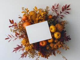 Autumn Still Life with Pumpkins, Fruits, Leaves, Berries, and a Blank Card photo