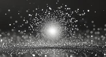 Abstract light and dust on a black background photo