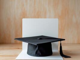 Graduation Cap on Wooden Surface, a Symbol of Achievement and Future Success photo