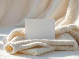 Blank card on a white blanket photo