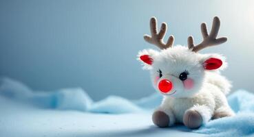 Cute Christmas Reindeer Plush Toy with Red Nose and Antlers, Festive Holiday Still Life photo