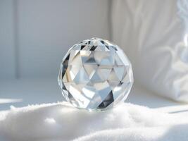 Crystal Ball on White Fluff, A Study in Light and Reflection, Closeup Perspective. photo