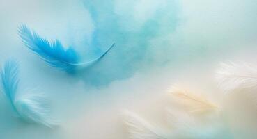 A blue and white feather background with a few feathers photo