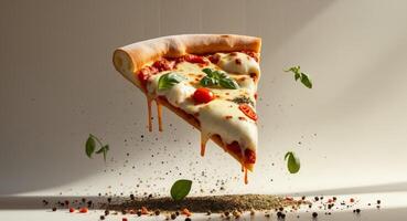 A slice of pizza is being held up by a string photo