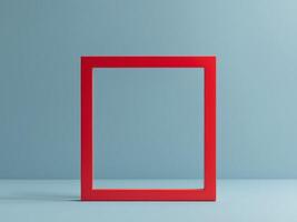 Minimalistic Composition with a Red Square Frame on a Light Blue Background. photo