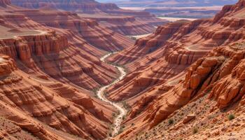 slopes of red and orange earth form patterns in a dry desert canyon. photo