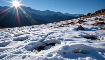 the last traces of snow melt beneath a springtime sun in the mountains. photo