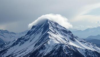 cold wind blows snow across the exposed crest of a mountain ridge. photo
