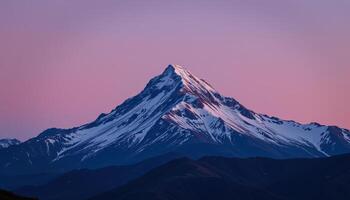 a ridge of ice gleams in the moonlight atop a remote mountain. photo