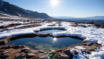 pools of melted snow collect in stone basins on a sun warmed plateau. photo