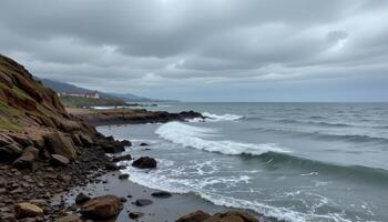 a salty breeze stirs the surface of a tidal inlet beneath grey skies. photo