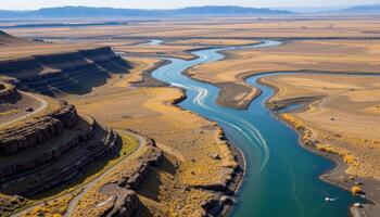 a braided river system cutting through a vast expanse of tundra and stone. photo