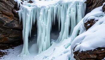 a frozen waterfall suspended in delicate patterns of ice and snow. photo