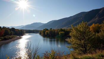 a wide river bend shimmering under the hot midday sun. photo