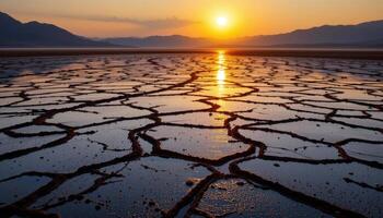 a network of shallow tidal flats glowing beneath the setting sun. photo