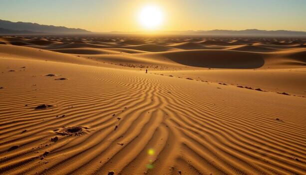 a vast sandy desert where windblown ripples create endless patterns under a blazing sun. photo
