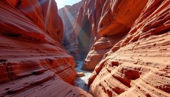 a sunlit canyon with walls painted in layers of red and orange, carved by centuries of water flow. photo