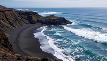 a secluded beach of black volcanic sand bordered by rocky outcrops and crashing waves. photo
