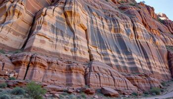 a dramatic cliff face layered with sedimentary rock creating a natural mosaic of colors. photo