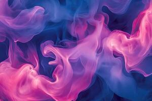 A pink and blue smoke swirl on a black background photo