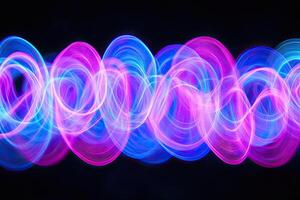 A long exposure photograph of a colorful light pattern photo