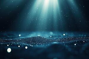 A dark blue background with light shining from the top photo