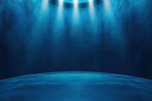 An empty room with a light coming from the ceiling photo