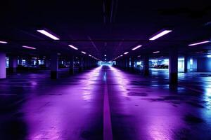 A purple light is shining on the floor of a parking garage photo