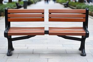 A bench sitting on a sidewalk photo
