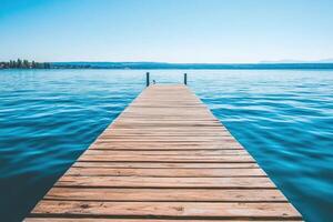 A wooden dock extending into the water photo