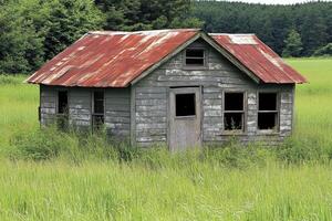 A small house in a field photo