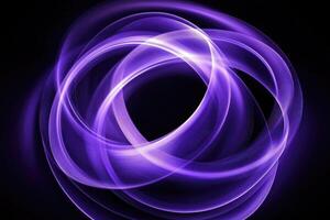 Abstract purple light swirls on a black background photo