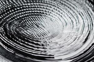 A black and white photo of a circular object