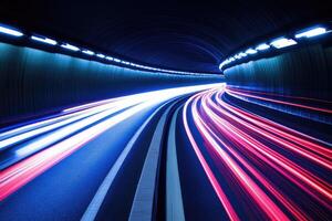 Light trails of cars in a tunnel photo