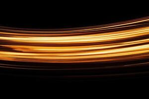 A long exposure photograph of a car driving at night photo