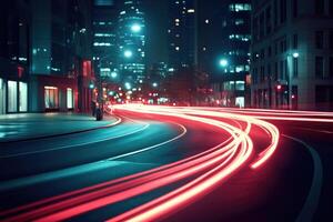 A city street at night with light trails photo
