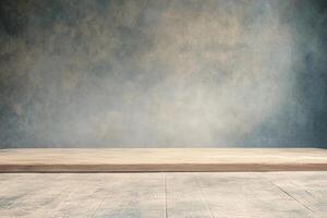 Empty wooden table in front of a blue wall photo