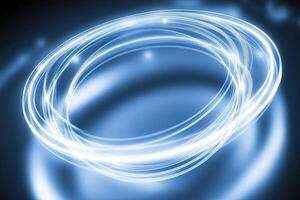 A blue light ring with a circular shape photo