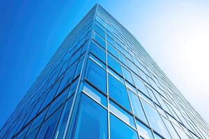 A tall building with blue glass windows photo
