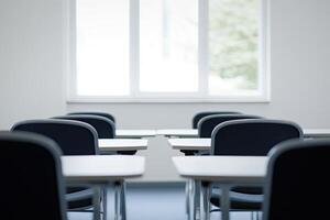 Empty classroom with black chairs and white window photo