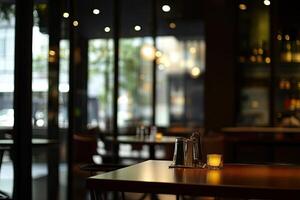 A table with a candle on it in a restaurant photo