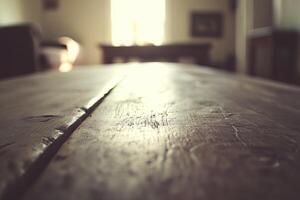 A wooden table with a light shining on it photo