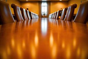 A long table with chairs in a room photo